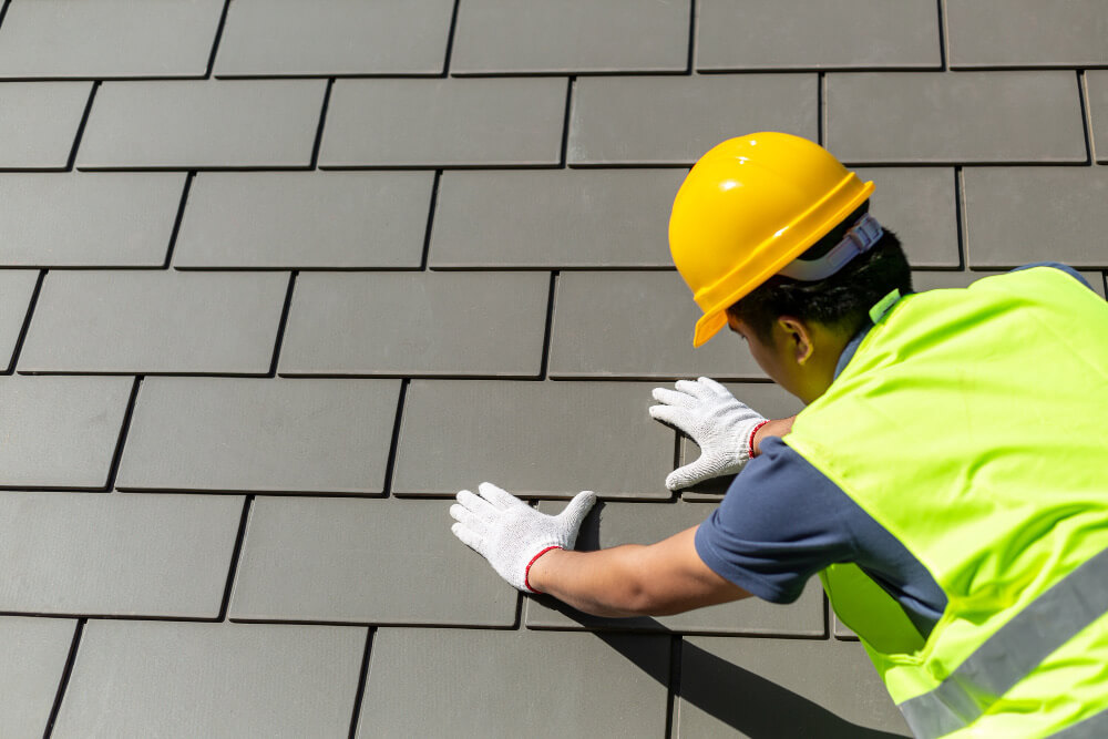 Tynemouth Roofing expert installing roof slates